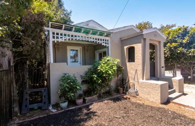 Modern Upgrades w/ Classic Oakland Charm & Driveway Leading to Rear Yard photos photos