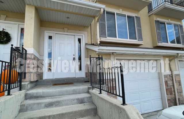 Charming 3-Bedroom Townhome with Garage in Sandy - Get $300 off First Month's Rent! photos photos