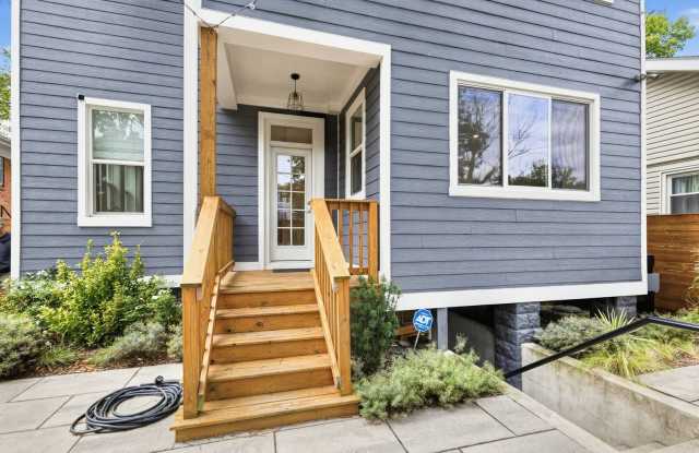 GORGEOUS Federal SFH w/EXQUISITE Backyard featuring large Flagstone Patio & Private Driveway w/EV Charger! Gallery 3