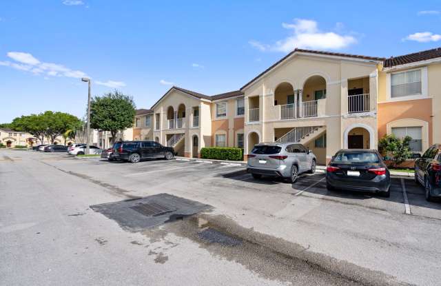 2-bath condo on the 2nd floor with a newly renovated kitchen featuring modern cabinets and granite countertops. Gallery 3