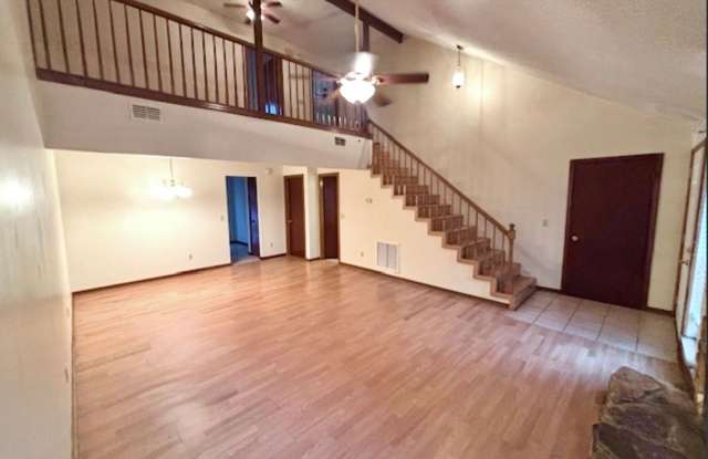 Spacious 3-Bedroom, 2-Bath End Unit Townhome with Attached Garage, Fenced in Backyard, Fireplace Loft! - 11647 Fort Caroline Lakes Drive, Jacksonville, FL 32225