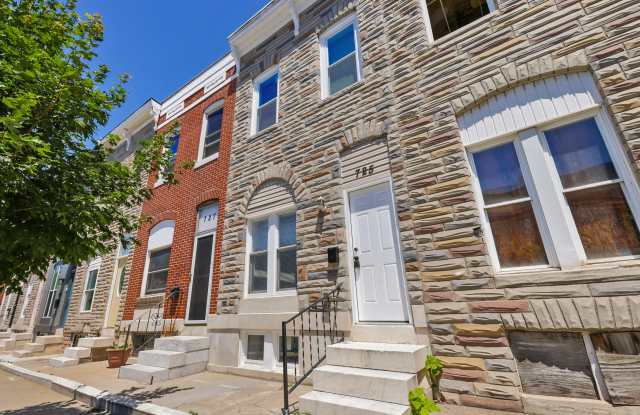 725 N Patterson Park Ave photos photos