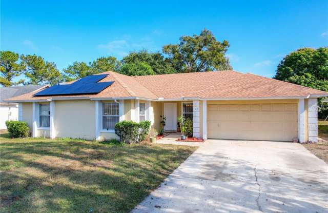 3 bedroom 2 bath home with solar panels, workshop, large backyard and Florida Room! photos photos