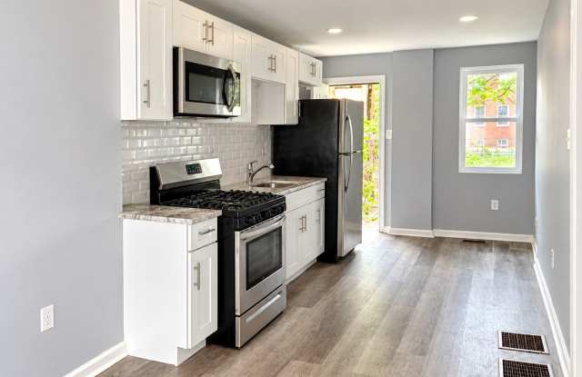 Bright 2-Bedroom Home with a Stylish Kitchen & Central Air Gallery 3