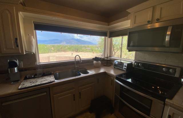 3 Bedroom 2 Bath perched on a scenic overlook with sweeping views of the Tucson Valley and city lights - 3627 West Suffield Lane, Casas Adobes, AZ 85741