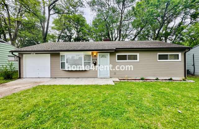 Lovely Three Bedroom Home in KCMO and an Updated Kitchen  w/ Granite and SS Appliances, including a Fenced Yard! photos photos