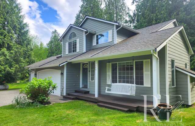 Forest-Edged Retreat with Pasture Access – Updated Home on Over Two Acres - 7340 Northeast State Highway 104, Kitsap County, WA 98346