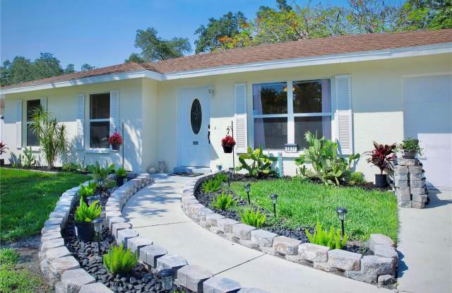 5831 WHISTLEWOOD CIRCLE - 5831 Whistlewood Circle, Sarasota Springs, FL 34232