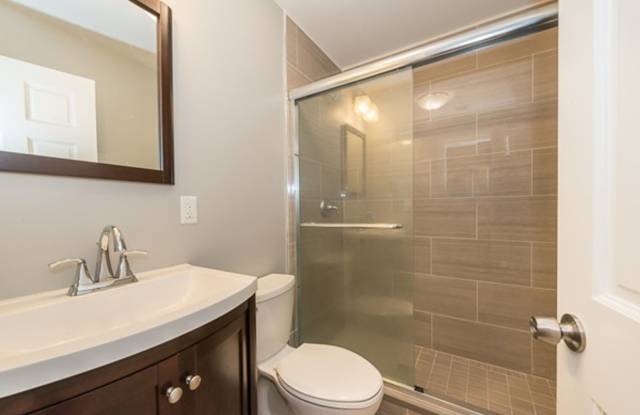 Nicely renovated and well-maintained 6-bed and 3-bath two-level gem in Mission Hill with laundry in unit! photos photos
