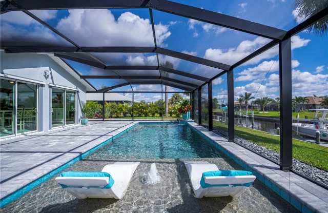 FURNISHED SHORT TERM RENTAL - 3 Bed / 2 Bath - Single Family Pool Home - $5,000/month ** Heated Swimming Pool ** Canal View photos photos