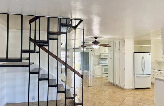 Spacious 3 Bedroom 2 Bathroom Town-Home with In-Unit Laundry, Pool and 2 Parking Spaces! photos photos