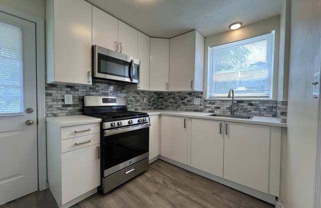 Updated 2BR house with off street parking! Gallery 1