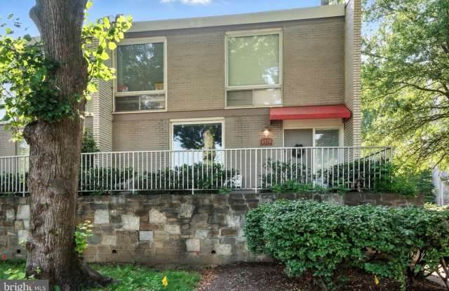 Welcome home to this beautifully updated 3-bedroom, 2.5-bath end unit townhouse photos photos