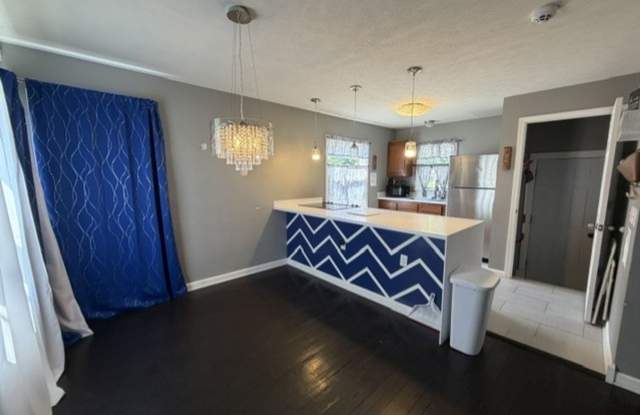Updated 3BR Home with Open-Concept Kitchen, Bonus Lower-Level Bedroom & Garage Gallery 4