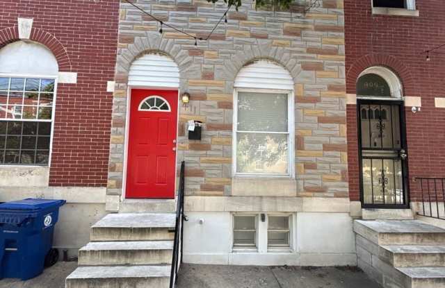 Charming Baltimore Rowhome with Private Deck & Exposed Brick Gallery 1