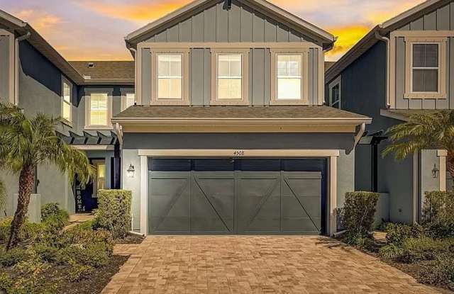 Stunning 3-Bedrooms, 2.5-Bathrooms townhome with a 2-stall Garage in the highly sought after Hammock Park. - 4508 Chinkapin Drive, Fruitville, FL 34232