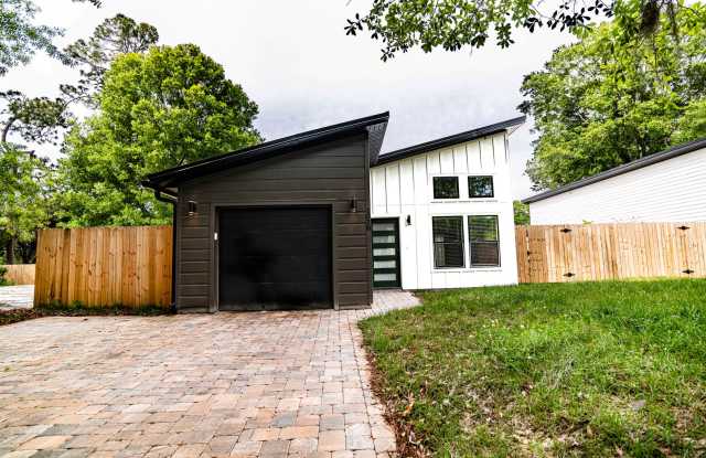 Spacious 3BR/3BA home in a quiet neighborhood near downtown and beaches, featuring private baths, outdoor seating areas, fenced yard, and modern comforts—perfect for short or long-term stays. photos photos