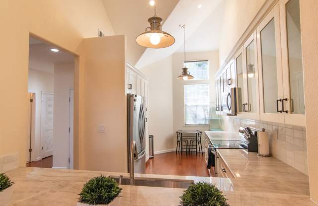 Light  Bright Top Floor Condo Near Apple Campus*2 Bedrooms Plus Loft*Secure Parking*Inside Laundry! photos photos