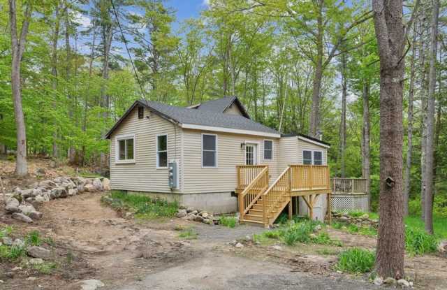 Renovated two-bedroom, one-bath apartment located directly across from Sebago Lake photos photos