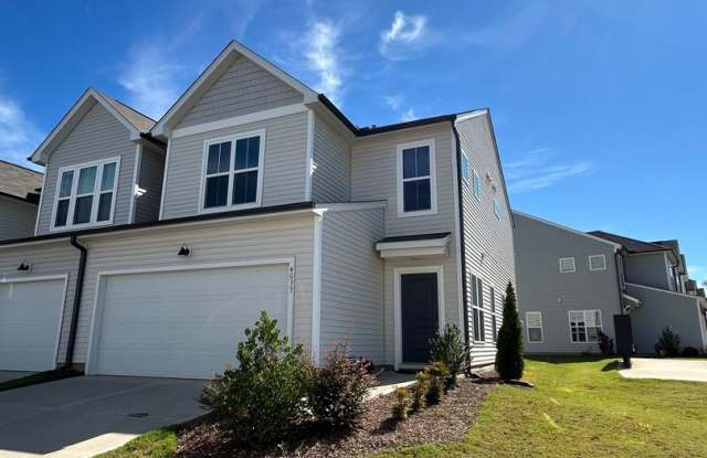 Modern Like-new 3 bedroom 2.5 bath townhouse in Jamestown w/2-car garage photos photos