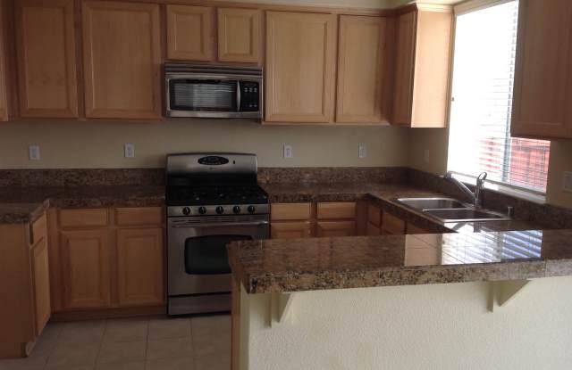 Home in Gated Community with Open Space Views Gallery 4