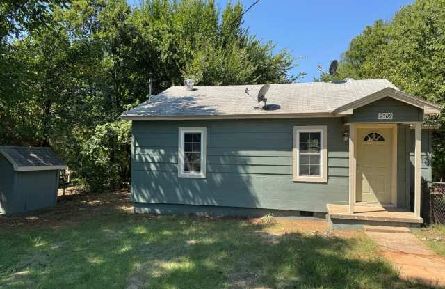 Two bedroom home with over half of acre of land photos photos