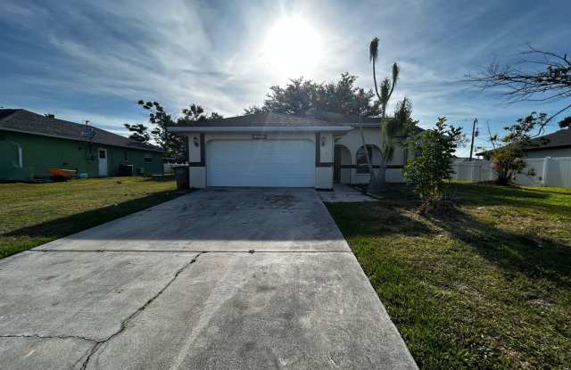 3307 SW 11th Pl - 3-Bedroom Single-Family Home with Screened lanai, new flooring and fence– Now Available in SW Cape Coral photos photos
