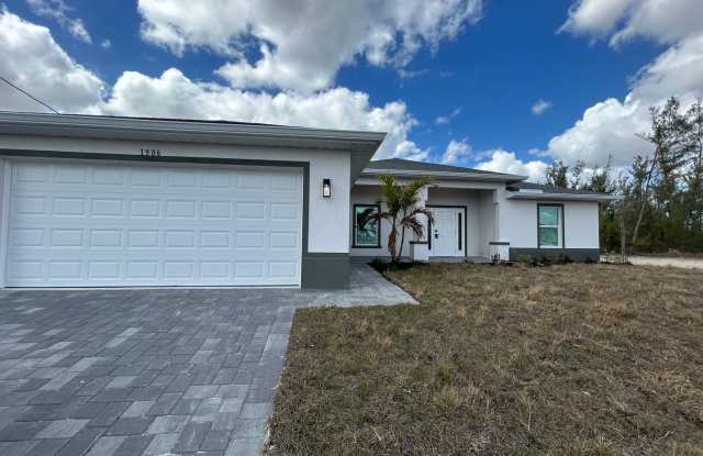 Brand New Construction 4/3 overlooking canal photos photos