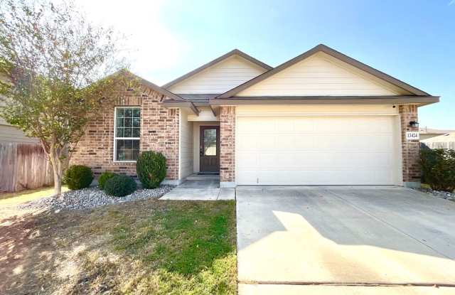 Charming 3-Bedroom Home with Modern Appliances  Prime Location Near Highway 90! photos photos