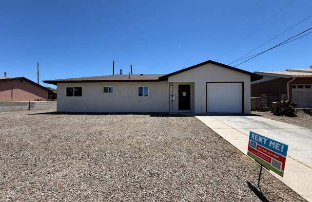 Updated 3 Bedroom Single Story Home Available Near Eubank Blvd NE & Constitution Ave NE! photos photos