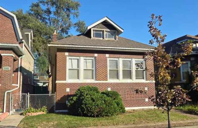 5-Bedroom, 2-Bath Brick Bungalow with Hardwood Floors and Finished Basement Gallery 1