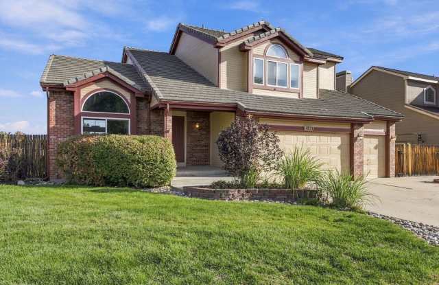 Spacious 4 Bedroom Home with Finished Walk-Out Basement, 3-Car Garage & Large Yard Gallery 1