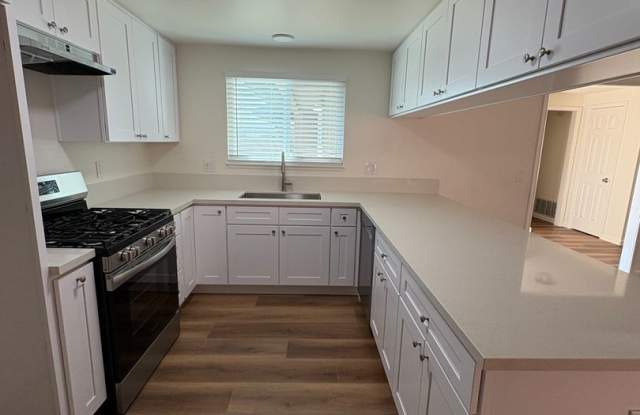 Beautifully updated 4 bedroom 2 bath home ready for move in! Gallery 4