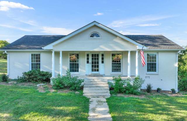 Tucked away on a scenic 7-acre retreat in the heart of Thompson's Station photos photos