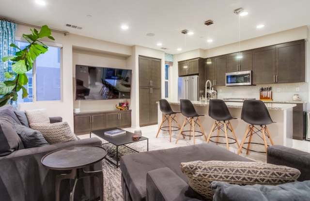 Stunning 3-bed, 3-bath townhome with bonus room in the gated Pacific Ridge community of Oceanside. photos photos