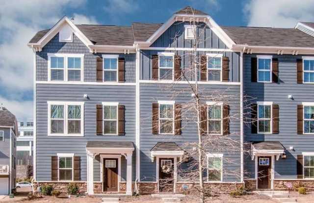 Stunning 3-bedroom, 2.5-bathroom, 2 car garage end unit townhome in the desirable Riverbend Towns community! - 1331 Ashbury Street, Charlotte, NC 28216