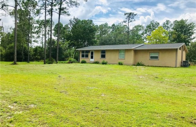 375 PINE WOODS ROAD - 375 Pine Woods Road, Volusia County, FL 32174