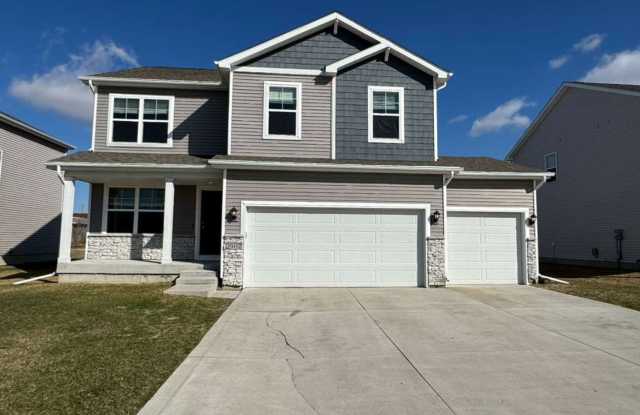 "Ankeny Oasis: Luxurious 4-Bedroom Home with Expansive 3-Car Garage and Secluded Backyard Retreat!" photos photos