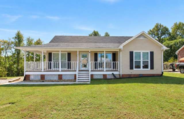 Pet-Friendly 3-Bedroom Home with Wraparound Porch Gallery 1