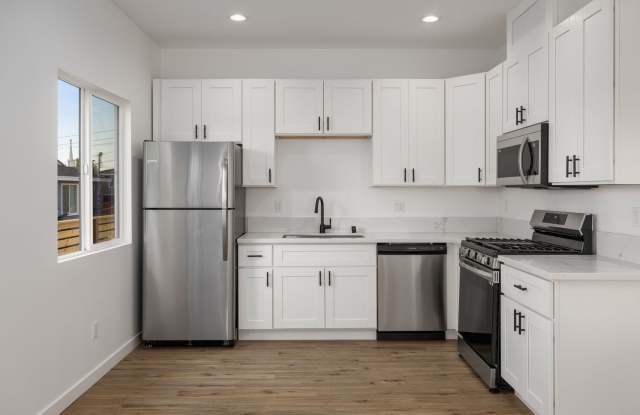 Spacious Remodeled 3BD/2BA with Private Balcony, In-Unit W/D + Parking photos photos