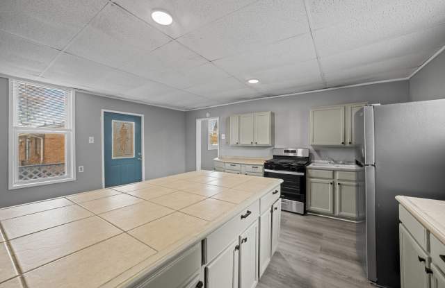 Updated 2-bedroom home for rent in Homestead, MUST SEE- HUGE Kitchen, front  back porch too! - 117 East 14th Avenue, Homestead, PA 15120