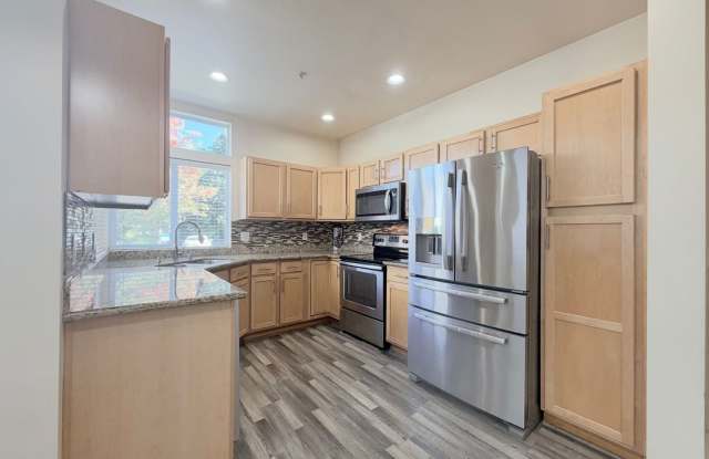 Bright 3-Bedroom Kent Home with Vaulted Ceilings, Covered Patio & 2-Car Garage Gallery 3