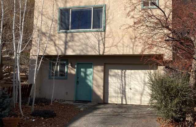 This spacious 2-bedroom, 1.5-bathroom townhome offers a private and comfortable layout in a prime location. - 525 Animas View Drive, Durango, CO 81301