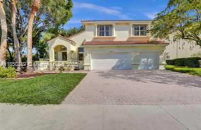 10730 Northwest 56th Court - 10730 Northwest 56th Court, Coral Springs, FL 33076