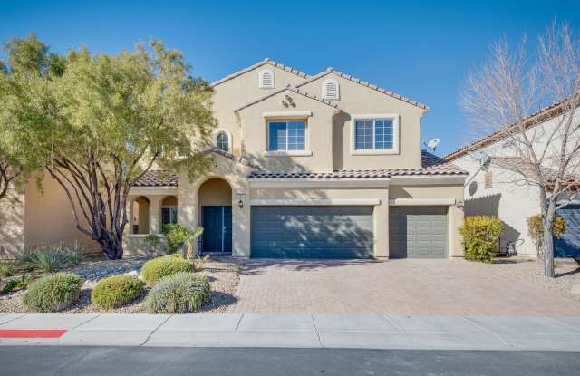 Gated single family home with 4 bed 3 baths  3 car garage in prime Henderson location. - 965 Via Arenula Street, Henderson, NV 89052