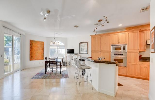 Harbor views! Double attached Garage with EV charging outlet! Balconies! Central AC! In Unit Washer & Dryer! photos photos