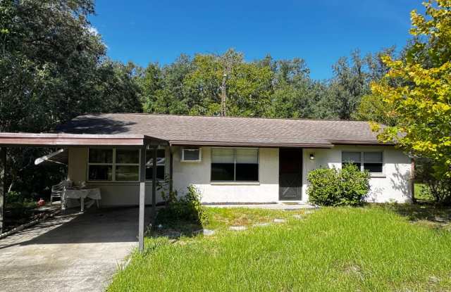 Charming 3-Bedroom Home with Beautiful Yard, Mature Trees & Modern Updates in Rainbow Lake Estates Gallery 1