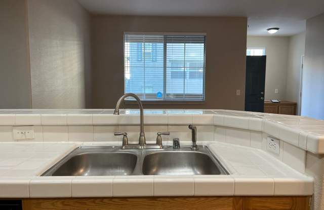 Great 2-bedroom 2 bath condo with A/C, 1 car garage and additional photos photos