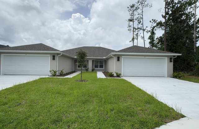 BRAND NEW FENCED Beautiful 4-bedroom, 3-bathroom Duplex in Double LL section of Palm Coast photos photos