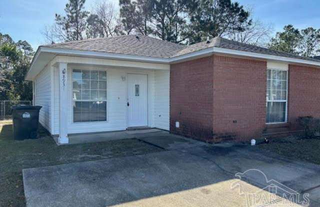 Charming Three Bedroom Two Bath Patio Home in Bay Pine Villas Gallery 1